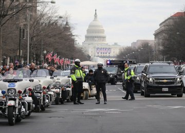 Police forces in a street leading to the US Capitol building