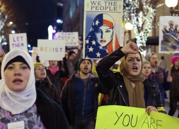 People march through downtown Seattle during a protest held in response to US President Donald Trump’s travel ban, Jan. 29.