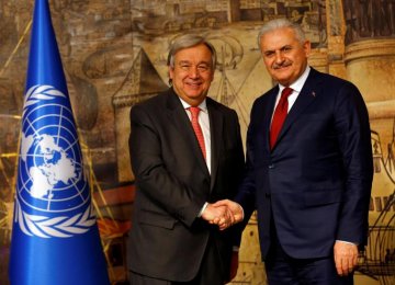 Turkish Prime Minister Binali Yildirim (R) and  UN Secretary-General Antonio Guterres attend a news conference in Istanbul, Turkey, on Feb. 10.