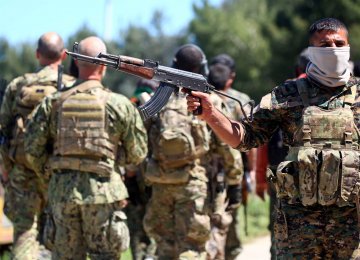 Caption: YPG fighters in northeastern Syria, April 25 (File Photo)