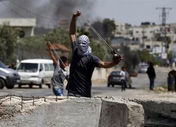 Protesters hurled stones at Israeli military vehicles.