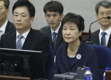 S. Korea’s Ex-President Goes on Trial for Corruption