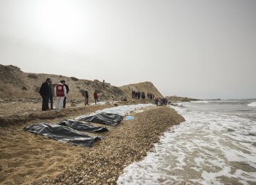 The dead bodies of refugees were lined up along the shore in Zawiya, Libya, on Feb. 21.