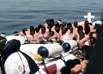 Migrants are rescued by staff members of the MV Aquarius in the central Mediterranean Sea on June 10.