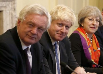 (From R-L) British Premier Theresa May, Boris Johnson and David Davis (File Photo) 