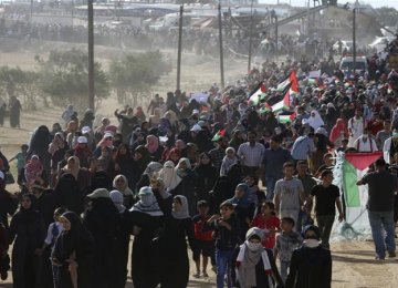 Israeli Forces Wound Scores of Women in Gaza Rally