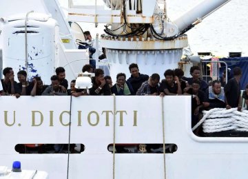 Migrants Disembark After Standoff as Italy’s Salvini Faces Probe