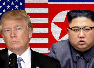 Donald Trump (L) and Kim Jong-un