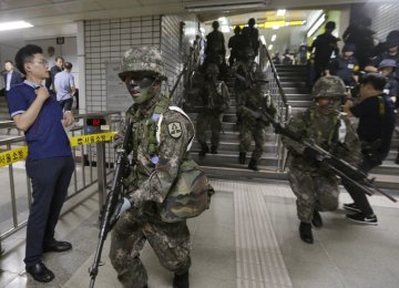 S. Korea Suspends Civilian Drills  to Help Talks With North