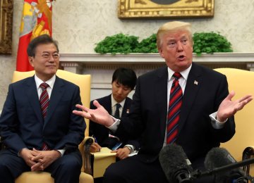 US President Donald Trump (R) and South Korean President Moon Jae-in in the Oval Office, Washington on May 22