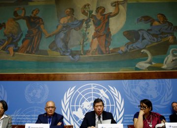 Members of the Independent International Fact-finding Mission on Myanmar attend a news conference on the publication of their final report at the UN in Geneva on August 27.