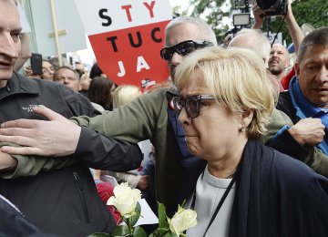 The head of Poland’s Supreme Court, Malgorzata Gersdorf, among her supporters (File Photo)