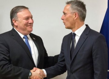 US Secretary of State Mike Pompeo (L) shakes hands with NATO Secretary General Jens Stoltenberg at NATO headquarters in Brussels on April 27.