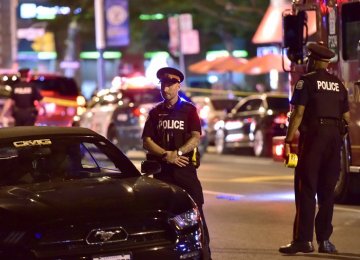 Gunman Shoots 14, Kills 1 in Toronto Rampage 
