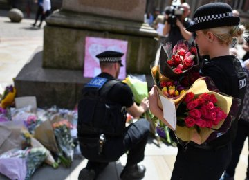 British security forces patrol Manchester, England, on May 22.