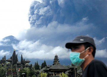 Mount Agung volcano eruption seen from Besakih Temple in Karangasem on the Indonesian island of Bali.