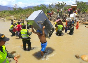 Venezuelans often arrive with little more than their clothes, many using unpaved roads to cross the two countries’ largely porous border or through the Tachira river.
