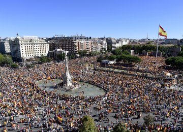 People take part in pro-union demonstrations across Spain calling for peace and dialogue between leaders on October 7.