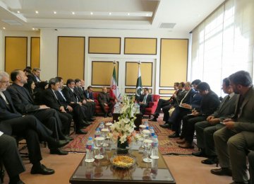 High-level Iranian and Pakistani officials confer on Dec. 25 in Islamabad.