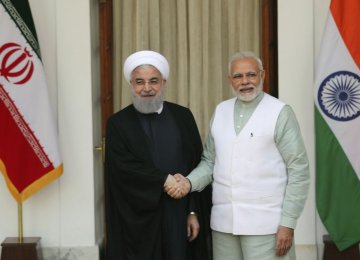 Indian Prime Minister Narendra Modi (R) shakes hand with Iranian President Hassan Rouhani before their delegation-level meeting in New Delhi, India, on Feb. 17, 2018. (File Photo)