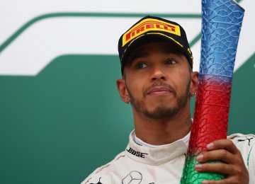Hamilton Admits Luck in Winning Over Ferrari