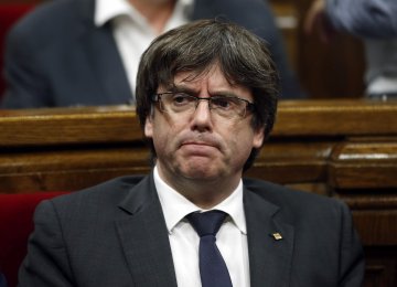 Sacked Catalonia Leader Surrenders to Belgian Police