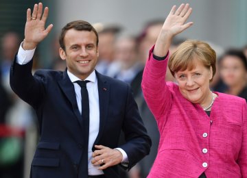 Merkel, Macron Plan Roadmap on Eurozone Reform