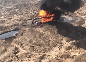 Iran: Battle to Put Out Burning Oil Well