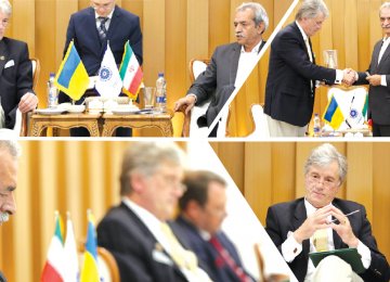 Ukrainian former president, Viktor Yushchenko, (Top L) met with Gholamhossein Shafei, the head of Iran Chamber of            Commerce, Industries, Mines and Agriculture, in Tehran on July 9. 