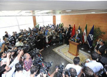 Total Chief Executive Officer Patrick Pouyanne speaks to reporters on the sidelines of signing a contract to develop Phase 11 of the South Pars Gas Field in Tehran, July 3. (Photo: Hassan Hosseini)