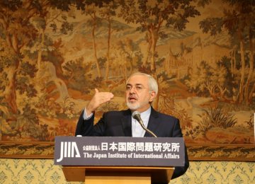 Foreign Minister Mohammad Javad Zarif addresses a seminar in Tokyo on Dec. 9. 