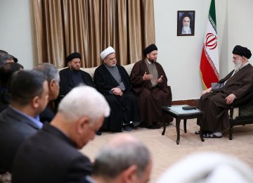 Ayatollah Seyyed Ali Khamenei receives Ammar Hakim, the leader of the National Iraqi Alliance (3rd L), and his accompanying delegation in Tehran on Dec. 11. 