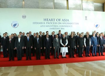 Top officials at the Heart of Asia confab pose for a group photo in India’s Amritsar on Dec. 4. 