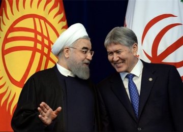 Iran’s President Hassan Rouhani (L) and his Kyrgyz counterpart, Almazbek Atambayev, in Bishkek, Kyrgyzstan, on Dec. 23.