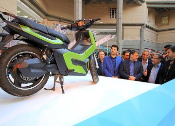 Officials take a closer look at the Chinese-derived electric bike.