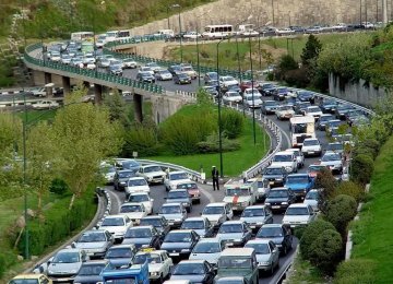 Nearly four million cars ply the streets of Tehran in a traffic system that can handle only two million.