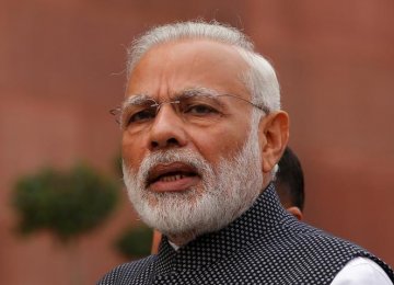 Modi Defends Clampdown on Cash Economy