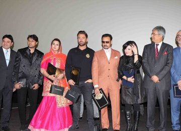 From left to right: Actor Nasrullah Qureshi, composer Dilshaad Shabbir Shaikh, actress Poonam Dhillon, actor Mohammad Reza Golzar, actor Gulshan Grover, a representative from the Indian Embassy, Indian Ambassador to Iran Saurabh Kumar  and film director Qorban Mohammadpur, at the opening ceremony of the movie at Tehran’s Kourosh Cineplex, December 3.