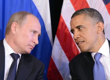 Vladimir Putin (L) with Barack Obama 