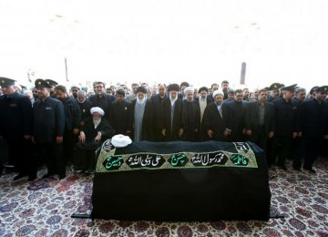 Leader Performs Prayers for Late Cleric 