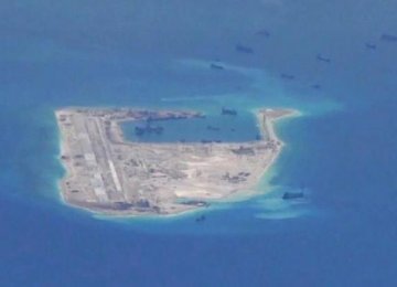 Chinese Aircraft Makes 1st Public Landing on Disputed Island