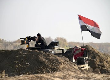Iraqi Military Says  Civilians Slowing Advance 
