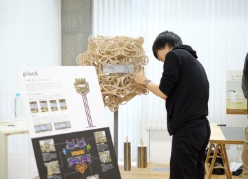 Japanese Student Builds  Unique Wooden Clock