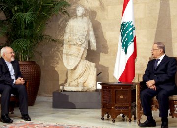 Foreign Minister Mohammad Javad Zarif (L) meets Lebanese President Michel Aoun in Beirut, Lebanon, on Nov. 7.