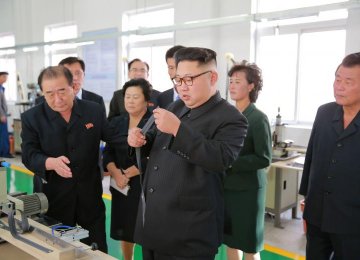 North Korean leader, Kim Jong Un, provides field guidance to the Mangyongdae Revolutionary Site Souvenir Factory in this undated photo released by North Korea’s Korean Central News Agency in Pyongyang on Oct. 7. (File Photo)