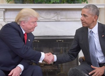 President Barack Obama (R) receives President-elect Donald Trump at the White House in Washington on November 10.