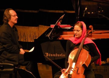 François Couturier (L) and Anja Lechner at the performance of Tarkovsky Quartet at Tehran's Vahdat Hall in 2013.