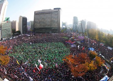 Demonstrators attend a protest against South Korean President Park Geun-Hye in Seoul on November 12.