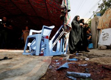 Suicide Bombing, Shootouts Kill 55 in Iraq
