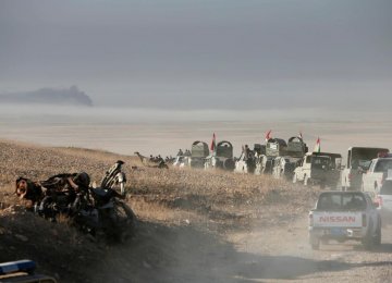 Peshmerga forces advance in the east of Mosul to attack IS terrorists in Mosul, Iraq, on Oct. 17.